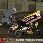 Cory Eliason (#8) racing with Daison Pursley (#25) Thursday at Knoxville Raceway. (Mark Funderburk Photo)