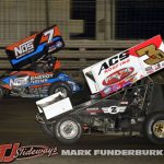 Tyler Courtney (#7) racing with Dustin Selvage (#3) Thursday at Knoxville Raceway. (Mark Funderburk Photo)