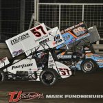 Kyle Larson (#57) racing for the lead with Daryn Pittman (#69K) Saturday at Knoxville Raceway. (Mark Funderburk Photo)