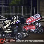 Hunter Schuerenberg (#19) and Emerson Axsom (#27) racing for position Friday at Knoxville Raceway. (Mark Funderburk Photo)