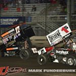 Cale Thomas (#17GP) and Logan Schuchart (#1S) Friday at Knoxville Raceway. (Mark Funderburk Photo)