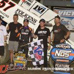 Kyle Larson and his crew in victory lane at Federated Auto Parts Raceway at I-55. (Mark Funderburk Photo)