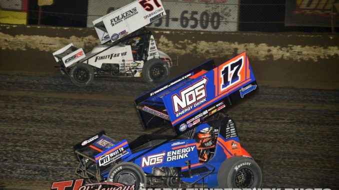 Kyle Larson (#57) outside of Sheldon Haudenschild (#17). (Mark Funderburk Photo)