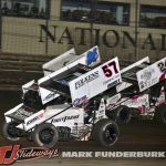 Kyle Larson (#57) gets by Rico Abreu (#24) for the lead at Knoxville Raceway while lapping Danny Sams III (#24D). (Mark Funderburk Photo)