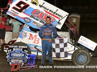 Paul Nienhiser in victory lane Saturday night with the Midwest Open Wheel Association at Macon Speedway. (Mark Funderburk Photo)