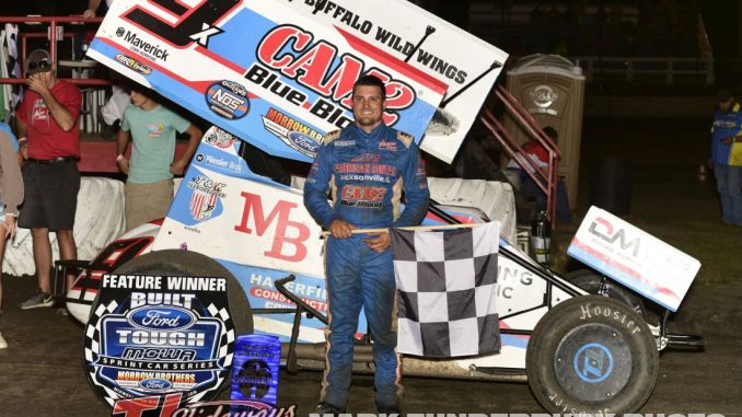 Paul Nienhiser in victory lane Saturday night with the Midwest Open Wheel Association at Macon Speedway. (Mark Funderburk Photo)