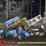 Donny Schatz (#15) racing with Logan Schuchart (#1S) Friday at Knoxville Raceway. (Mark Funderburk Photo)