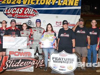 Xavier Doney with his family and crew in victory lane at Lucas Oil Speedway. (Ryan Black Photo)