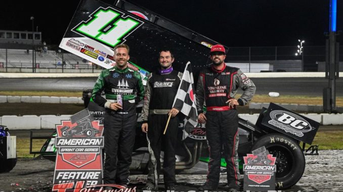 (L to R) Second place Seth Bergman, winner Roger Crockett, and third place Sam Hafertepe Jr. after the ASCS National Tour feature at Arrowhead Speedway. (Emily Schwanke Photo)