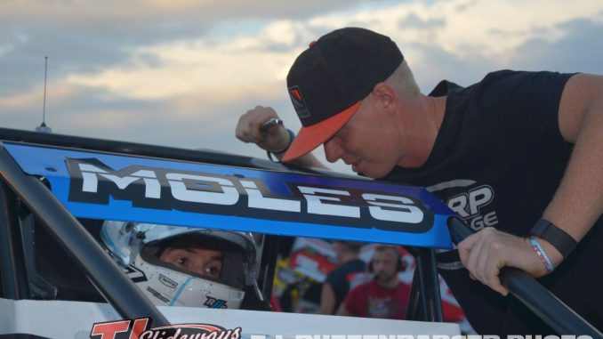 Clinton Boyles leans in with some words of wisdom for Mitchel Moles before USAC Silver Crown Series qualifying. (T.J. Buffenbarger Photo)