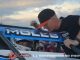 Clinton Boyles leans in with some words of wisdom for Mitchel Moles before USAC Silver Crown Series qualifying. (T.J. Buffenbarger Photo)