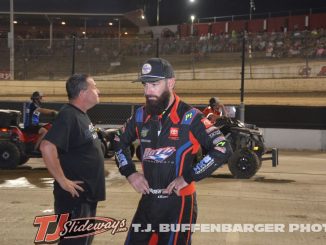 James McFadden looking over his race car at Eldora Speedway. (T.J. Buffenbarger Photo)