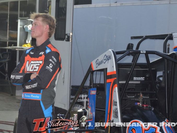 Daison Pursley watching qualifying at Eldora Speedway. (T.J. Buffenbarger Photo)