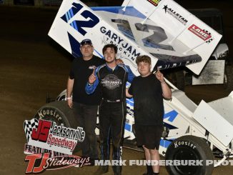 Corbin Gurley with his family and crew in victory lane Friday at Jacksonville Speedway. (Mark Funderburk Photo)