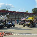 Cars being pushed up for hot laps at Eldora Speedway. (T.J. Buffenbarger Photo)