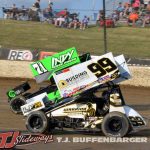 Skylar Gee (#99) racing with Parker Price-Miller (#99) Thursday at Eldora Speedway. (T.J. Buffenbarger Photo)