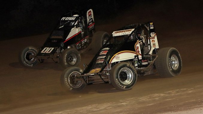 Isaac Chapple (#6) racing with Parker Fredrickson (#00) Friday at Mt. Pleasant Speedway. (Jim Denhamer Photo)