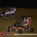 Karter Sarff (#21) and Gavin Miller (#97) racing for position Saturday at Spoon River Speedway with the Xtreme Outlaw Midget Car Series. (Mark Funderburk Photo)