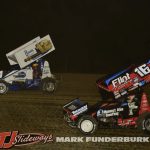 Kameron Key (#12X) racing with Max Guilford (#16C) Friday night at Spoon River Speedway. (Mark Funderburk Photo)