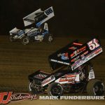 Kameron Key (#12X) racing with Max Guilford (#16C) Friday night at Spoon River Speedway. (Mark Funderburk Photo)