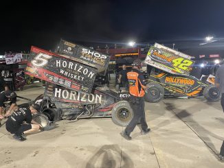 Crews were busy in the work area and tearing down wrecked race cars after a wild night at Eldora Speedway. (T.J. Buffenbarger Photo)
