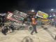 Crews were busy in the work area and tearing down wrecked race cars after a wild night at Eldora Speedway. (T.J. Buffenbarger Photo)