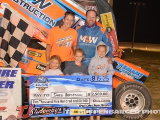 Jared Horstman with his wife and daughters in victory lane at I-96 Speedway. (T.J. Buffenbarger Photo)