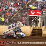 Jason Blonde taking the white flag at Butler Motor Speedway. (T.J. Buffenbarger Photo)