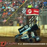 Dan McCarron takes the checkered flag Saturday at Butler Motor Speedway. (T.J. Buffenbarger Photo)