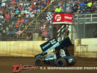 Dan McCarron takes the checkered flag Saturday at Butler Motor Speedway. (T.J. Buffenbarger Photo)