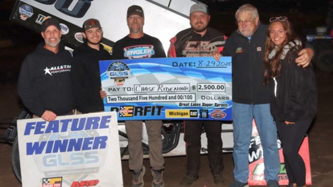Chase Ridenour in victory lane with this crew Friday night at Tri-City Motor Speedway. (Jim Denhamer Photo)