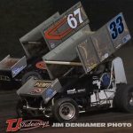 Kevin Martens (#67) racing with Jeremy Ferguson (#33) Friday at Tri-City Motor Speedway. (Jim Denhamer Photo)