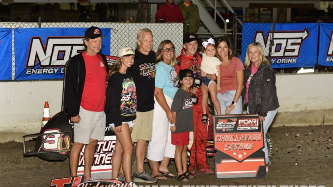 Kameron Key with his family and team in victory lane at Federated Auto Parts Raceway Park at I-55. (Mark Funderburk Photo)