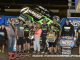 Jason Johnson with his race team in victory lane at Federated Auto Parts Speedway at I-55. (Mark Funderburk Photo)