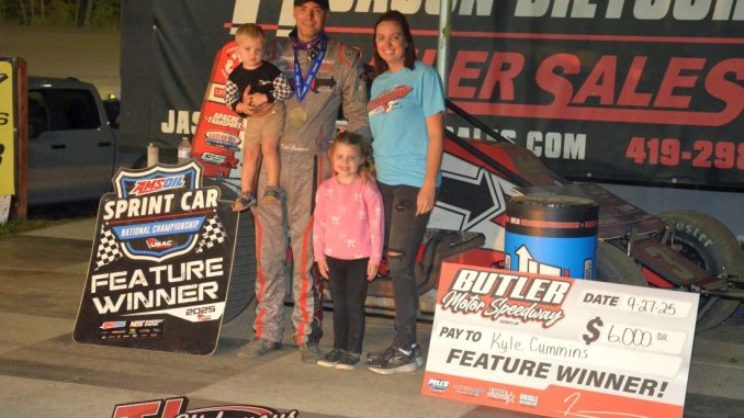 Kyle Cummins with his family in victory lane Saturday night at Butler Motor Speedway. (T.J. Buffenbarger Photo)