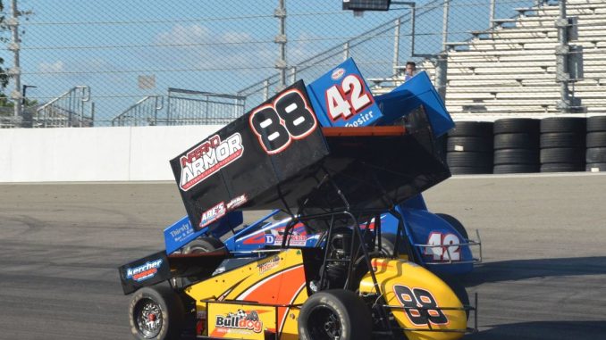 Jimmy McCune (#88) racing with Jason Blonde (#42) Sunday at Owosso Speedway. (T.J. Buffenbarger Photo)