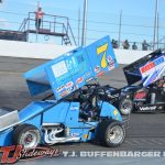 Bobby Komisarski (#7) racing with Troy DeCaire (#26) Sunday at Owosso Speedway. (T.J. Buffenbarger Photo)