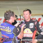 Jacob Seelman interviewing Kody Swanson after the feature event Sunday night at Owosso Speedway. T.J. Buffenbarger Photo)