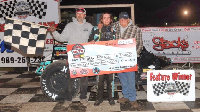 IMG_3584 Max Frank with his family and crew in victory lane Saturday night at Silver Bullet Speedway. (Jim Denhamer Photo)