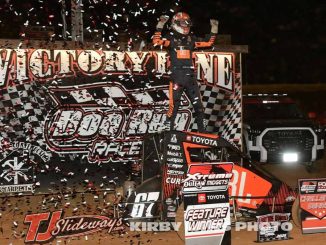 Jacob Denney after his victory at Doe Run Raceway with the Xtreme Outlaw Midget Car Series. (Kirby Laws Photo)