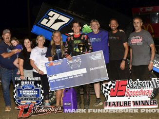 Bryce Norris with family and crew after winning the MOWA Sprint Car feature Friday night at Jacksonville Speedway. (Mark Funderburk Photo)