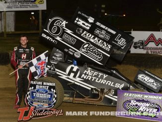 Kaleb Johnson after winning the Midwest Open Wheel Association portion of the Tom Knowles Memorial Saturday night at Spoon River Speedway. (Mark Funderburk Photo)