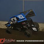 Reed Whitney rides the fence at Tri-City Speedway. (Mark Funderburk Photo)