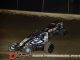 Logan Seavey (#57) racing with Justin Grant (#4) Friday at Tri-City Speedway. (Mark Funderburk Photo)