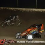 Cale Coons (#63) racing with Jadon Rogers Friday at Tri-City Speedway. (Mark Funderburk Photo)