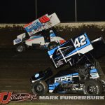 Howard Moore (#40) and Preston Perlmutter (42) Friday at Tri-City Speedway. (Mark Funderburk Photo)