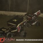 Clinton Boyles (#19) racing with Xavier Doney (#74) Friday at Tri-City Speedway. (Mark Funderburk Photo)