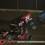 Xavier Doney (#74) racing with Adyn Schmidt (#12) Friday at Tri-City Speedway. (Mark Funderburk Photo)