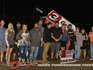 Jake Neuman with family and crew members after winning the feature event Friday at Jacksonville Speedway. (Mark Funderburk Photo)
