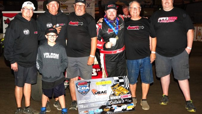 R.J. Johnson and his crew after winning the USAC/CRA Sprint Car Series feature at Perris Auto Speedway. (AJ Johnson/P1 Racing Images Photo)
